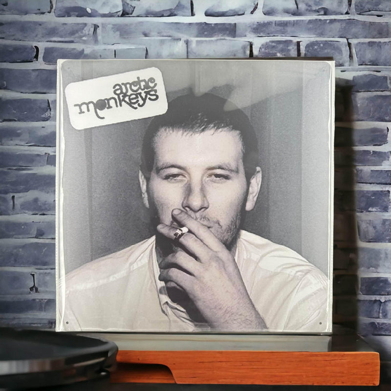 Album Cover Metal Sign: Arctic Monkeys - Whatever People Say I Am, That's What I'm Not - DD Music Geek