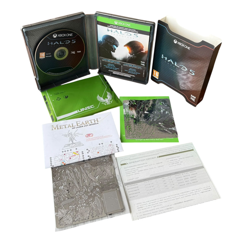 Halo 5 gaming bundle with disc, case, and accessories on a white background