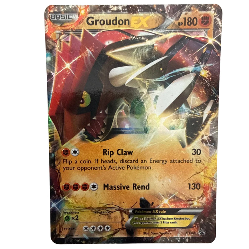 A single Pokémon trading card for Groudon EX, shown flat against a plain light background. The card features artwork of Groudon with red, black, and gold/yellow energy effects, and visible text including 'Groudon EX', 'hp 180', and move names 'Rip Claw' and 'Massive Rend'.
