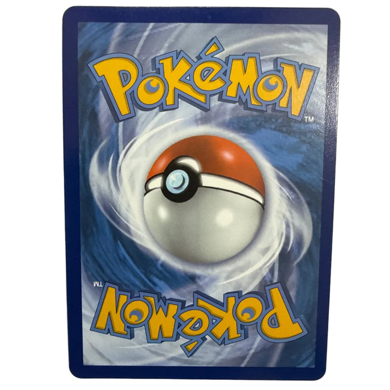 A single Pokémon trading card featuring the classic red-and-white ball design on a blue swirling background, with the Pokémon logo in yellow at the top and mirrored at the bottom, photographed against a plain light wall.
