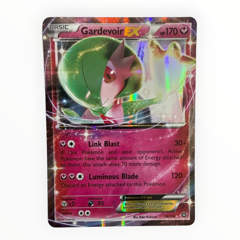 A holographic Pokémon trading card featuring Gardevoir EX from the Basic set, with a pink and green character illustration and shiny iridescent reflections across the card surface.