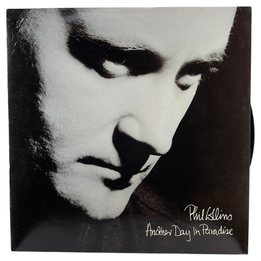 Phil Collins: Another Day In Paradise 12" [Preowned Vinyl] VG/VG+ - DD Music Geek